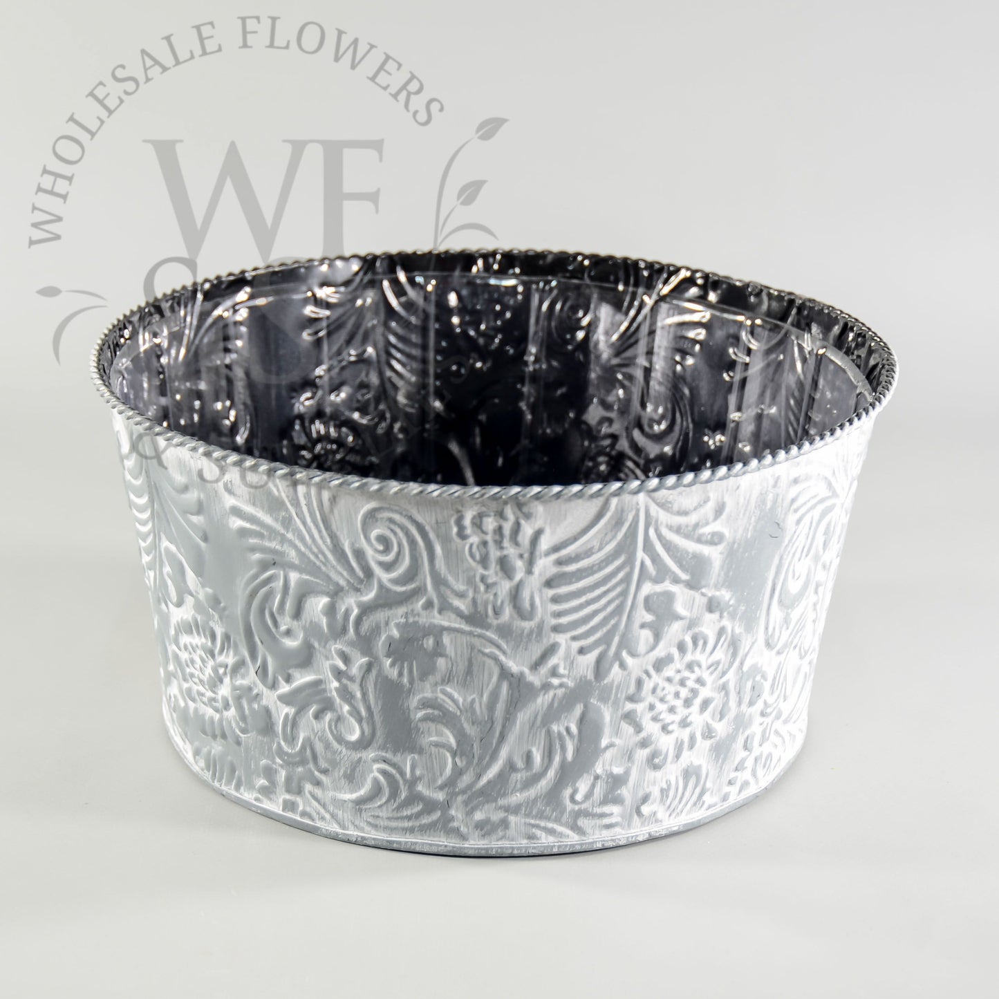 Pressed metal gray cylinder planter